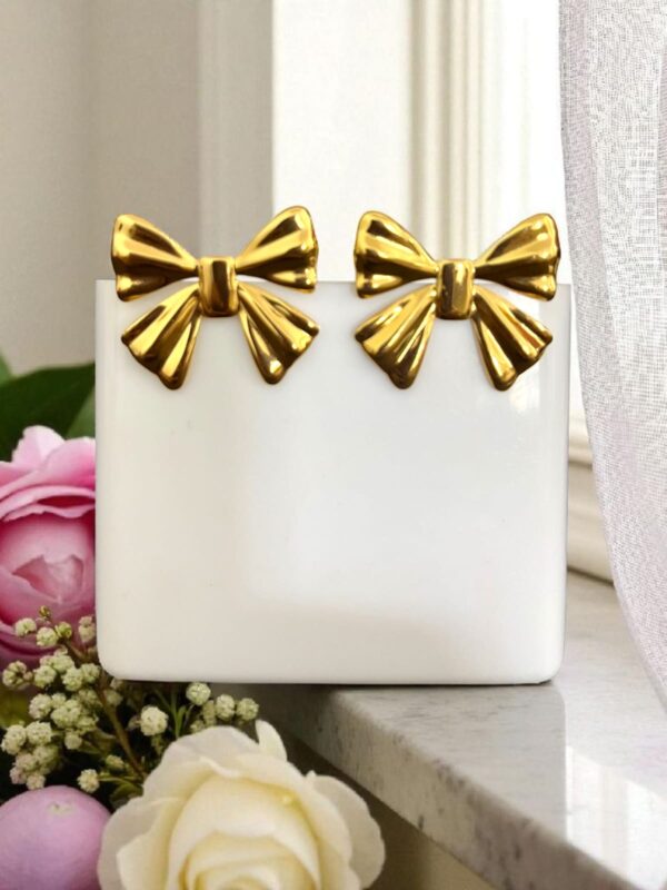 Shiny bow earrings